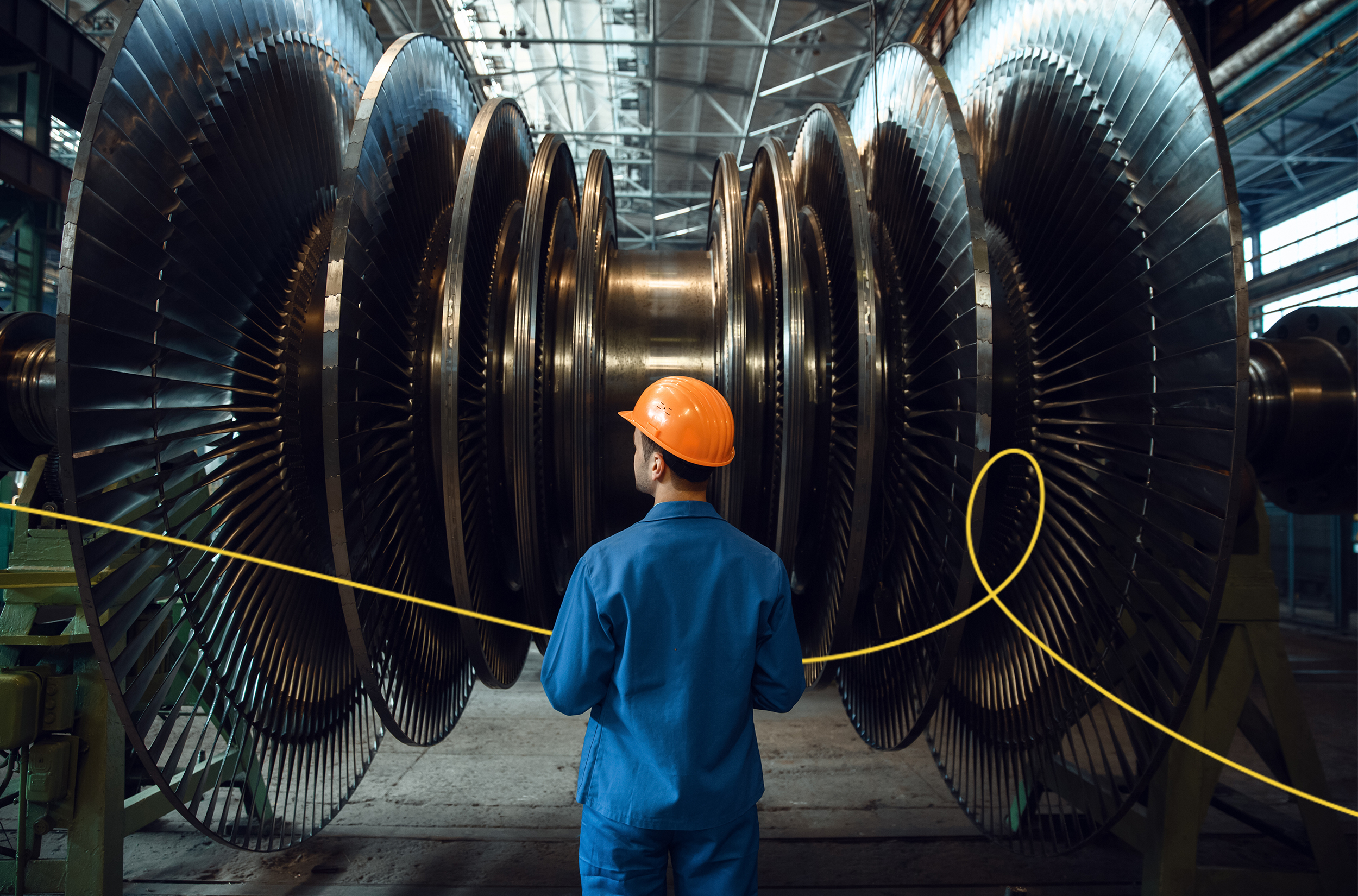 Worker with helmet in factory