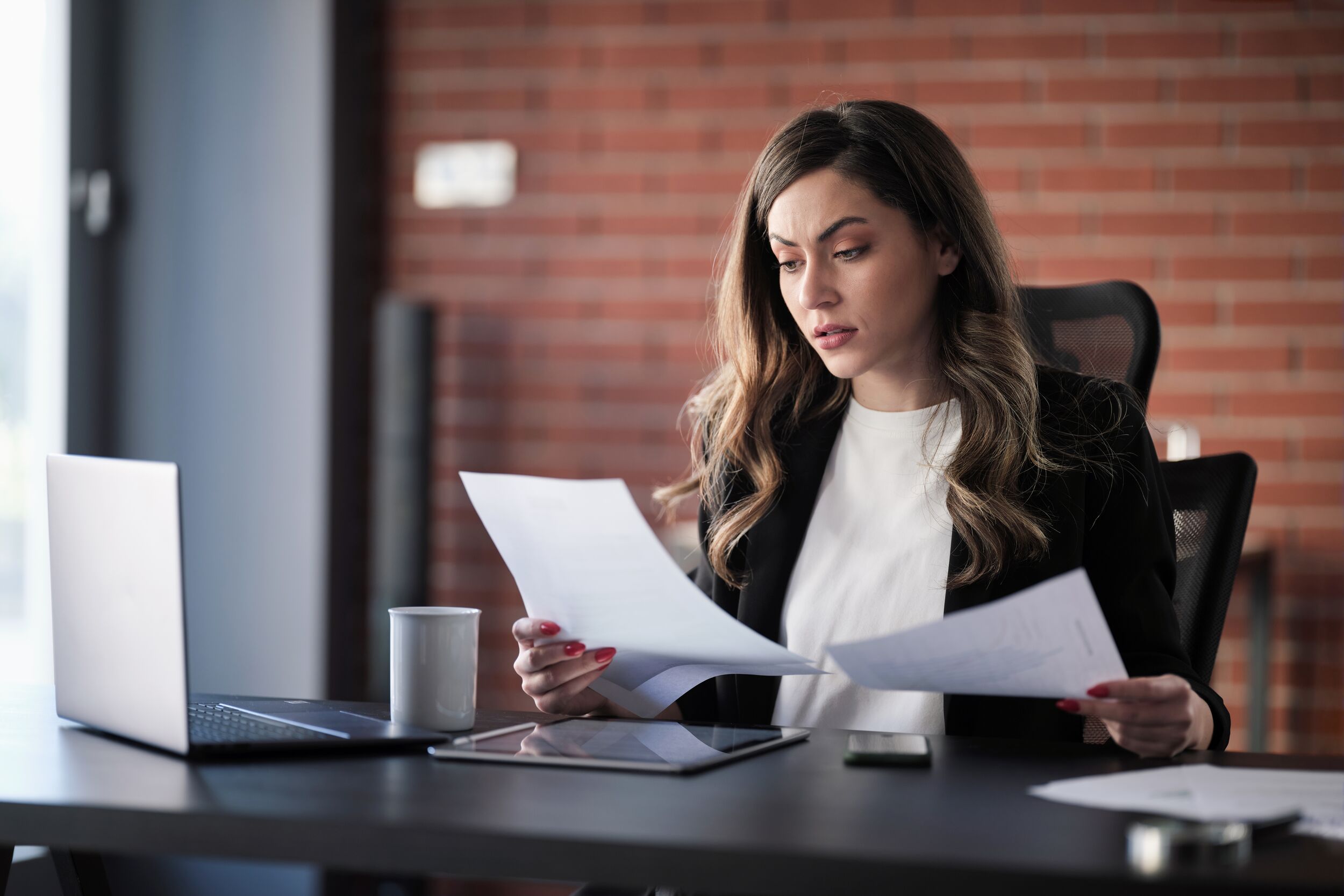 Business woman working at her desk.