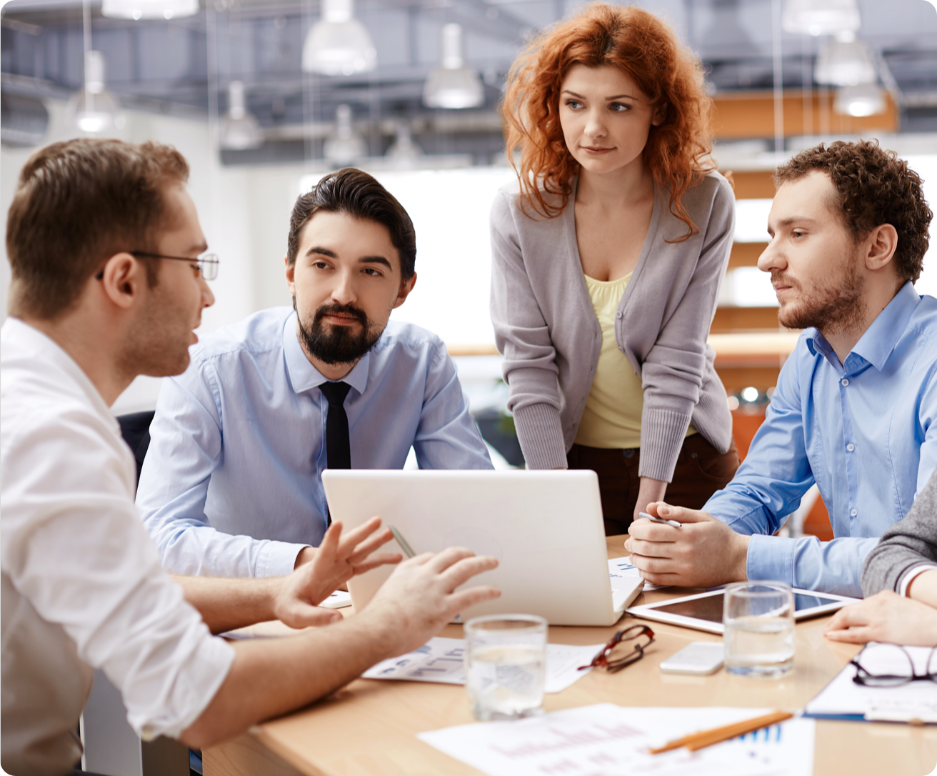 Young professional confer at a table