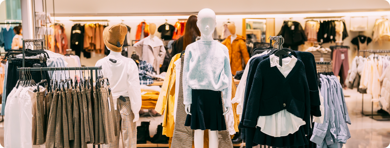 Interior of a clothing store with mannequins.